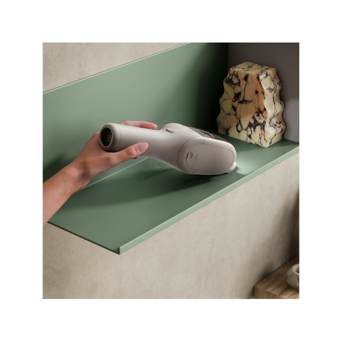 Product vacuuming fine dust on a shelf