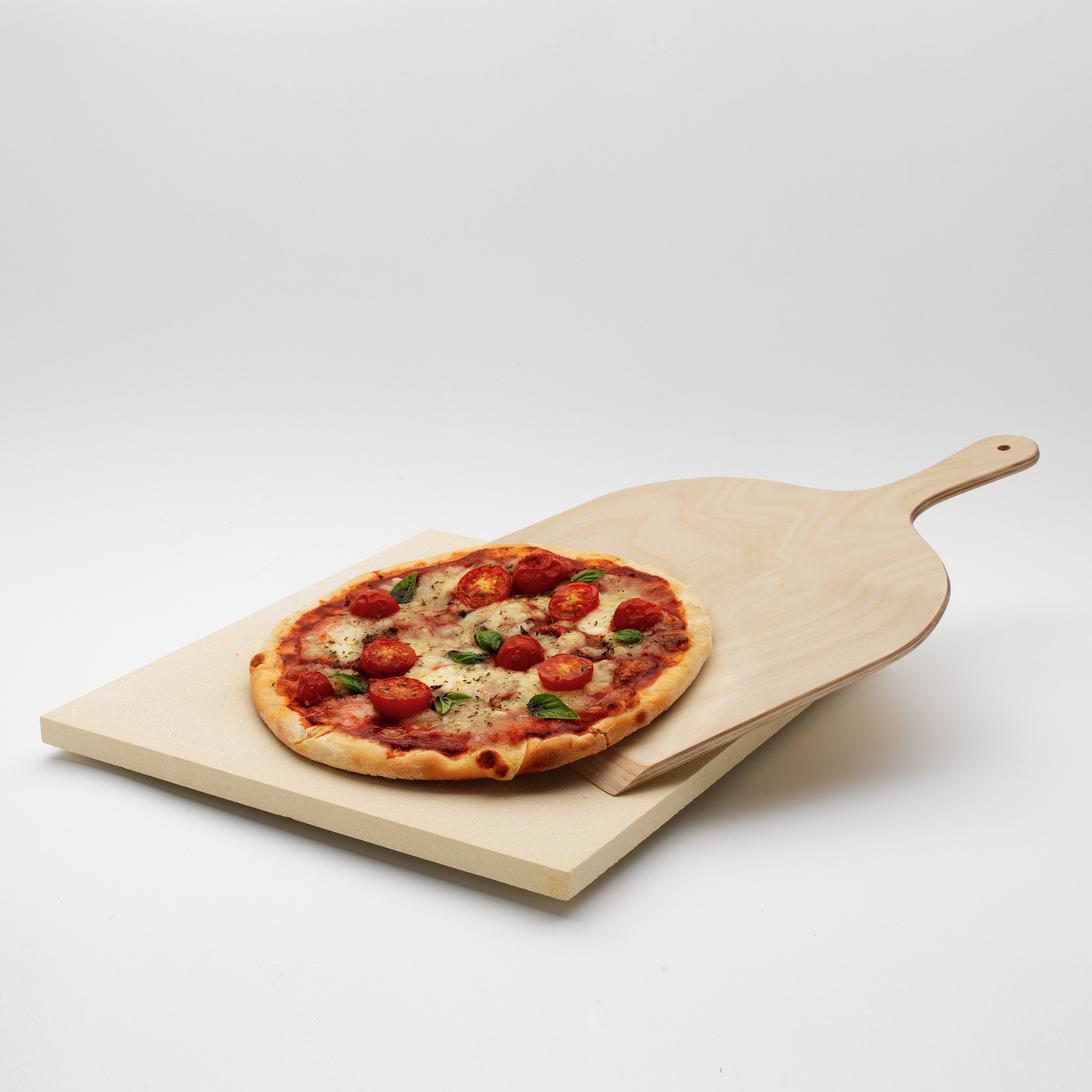 Kamenný set na pizzu s pizzou